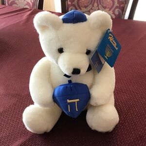 White Plush Toy with Blue Accents